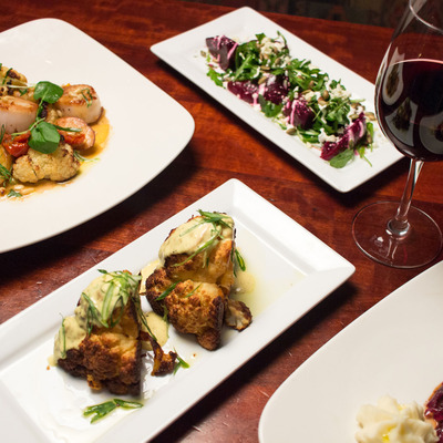 table full of food and red wine