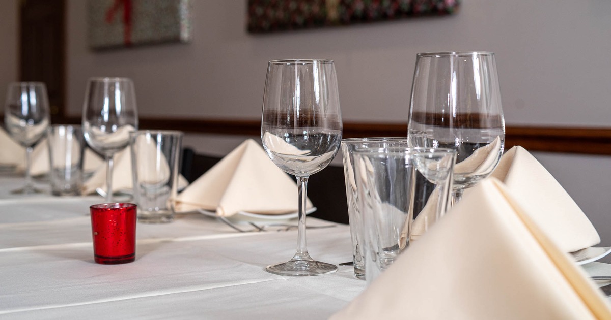 Interior, table set for guests