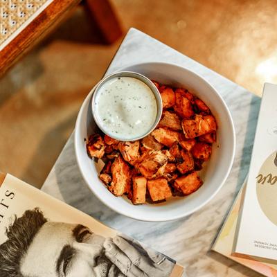 Roasted sweet potatoes with dip.