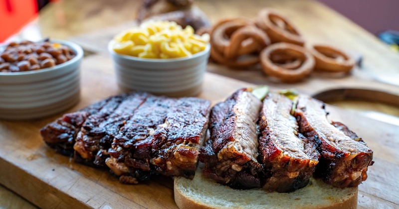 Rib slab with sides of mac and cheese and baked beans