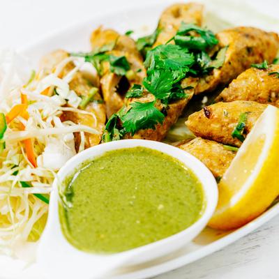 Chicken Seekh Kabab with mint chutney.