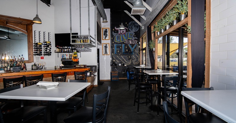 Interior, tables and chairs ready for guests