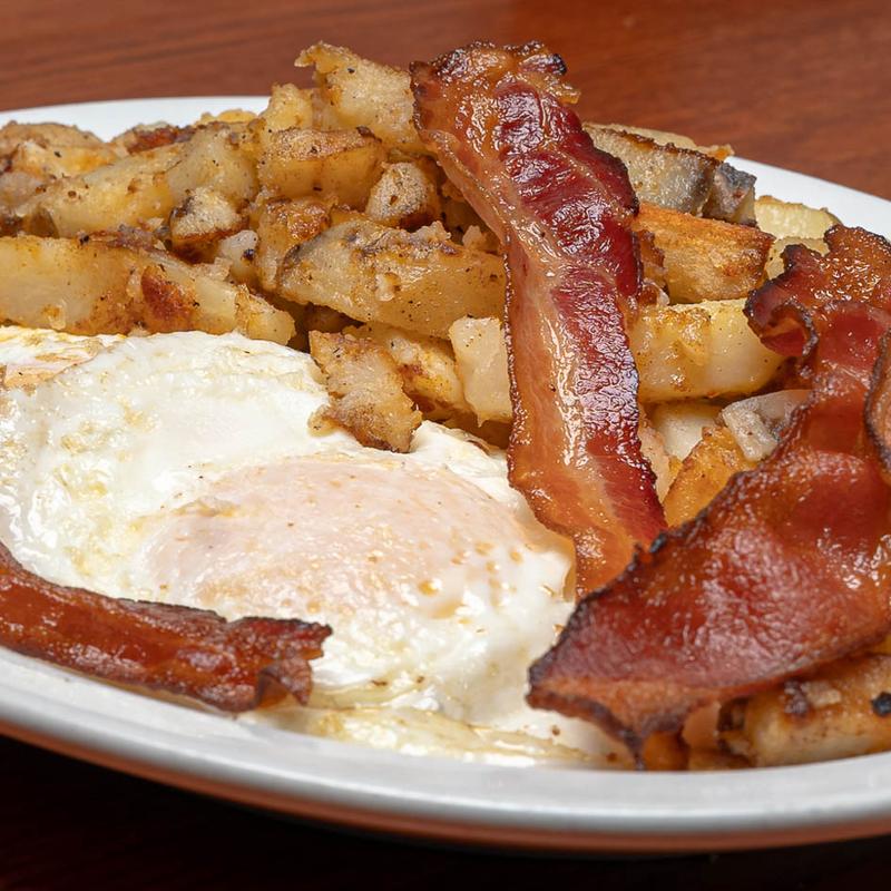 Two Eggs with Turkey Sausage Patties Or Turkey Bacon photo