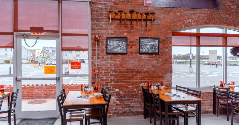 Interior seating area with tables and chairs