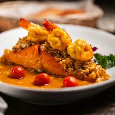 Pan-seared, crab-crusted salmon with shrimp and mango sauce.