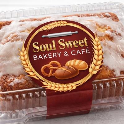 Packaged banana bread with frosting.