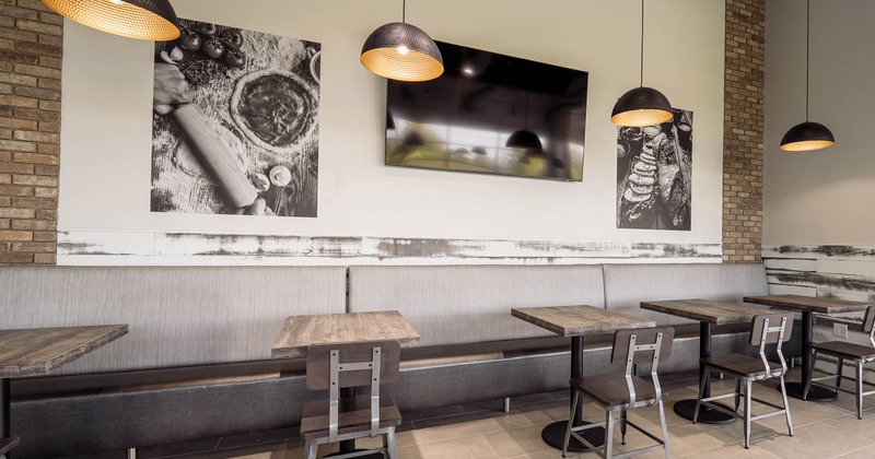 Interior, banquette seating with tables