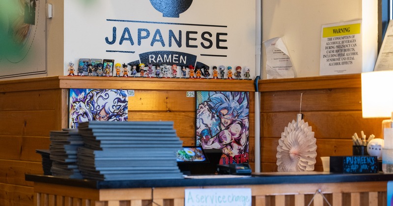 Interior, food counter, sign above