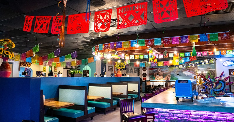 Lined up dining booths near the bar