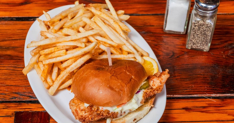 Fried chicken sandwich served with french fries