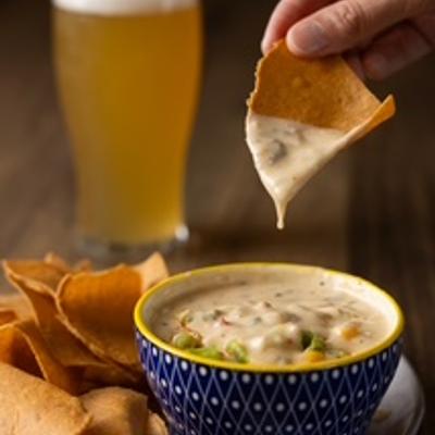 street corn dip glass of beer.
