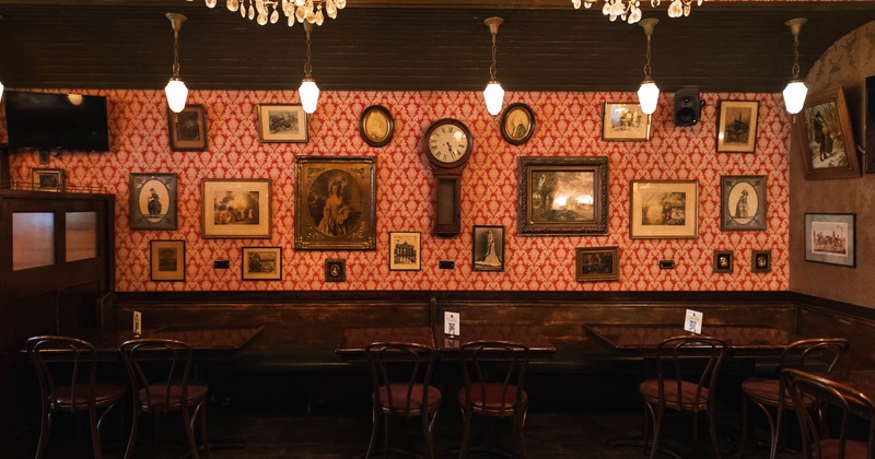 Interior, dining area, wall decorated with pictures