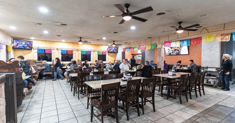 Inside, seating area with guests