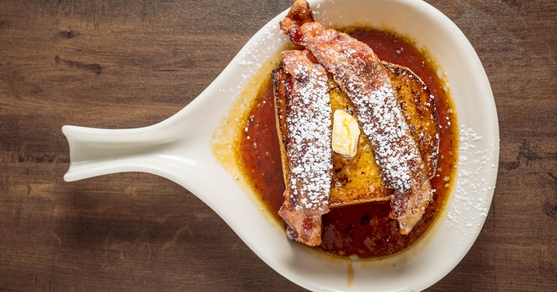 French Toast with honey, butter, and bacon