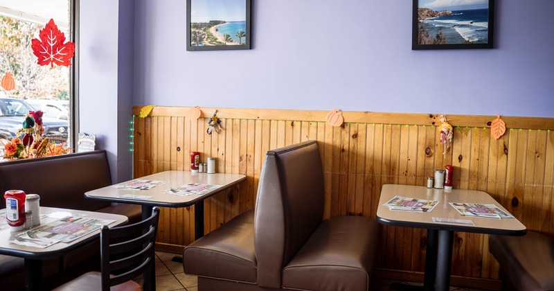 Seating booths by the windows