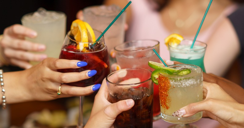 Fish and chips, coleslaw, lemon wedges and a can of Guinness