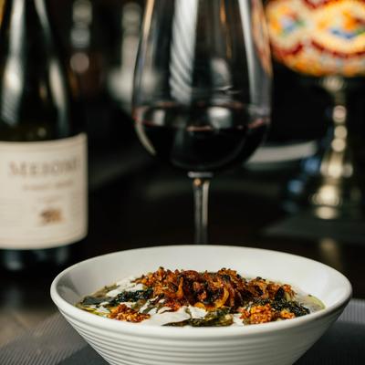 Persian soup and a glass of red wine.