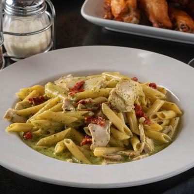 Pasta with grilled chicken.