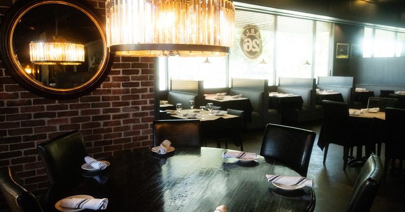 Restaurant interior, dining area with set tables