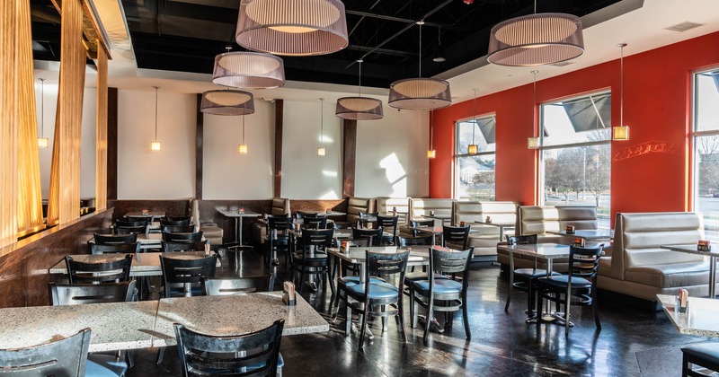 Inside, seating area with tables and chairs