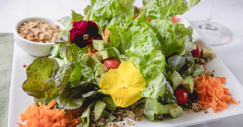 Mixed greens and vegetables salad platter