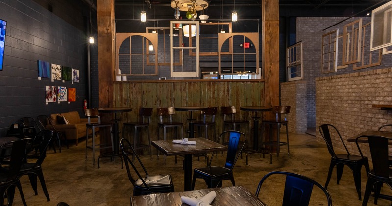 Interior, tables and chairs in seating area