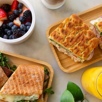 Sandwiches and a fruit bowl.