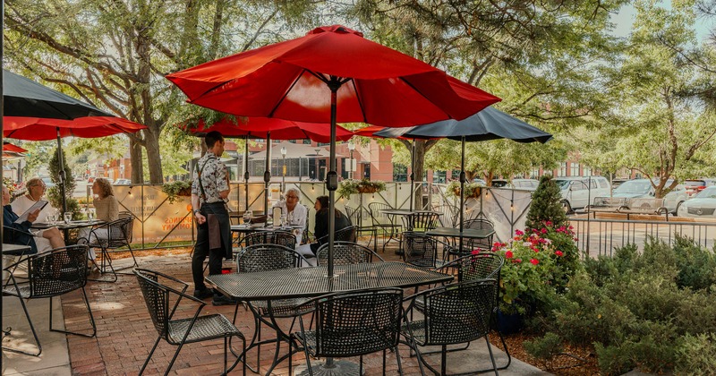Exterior, tables with parasols and chairs