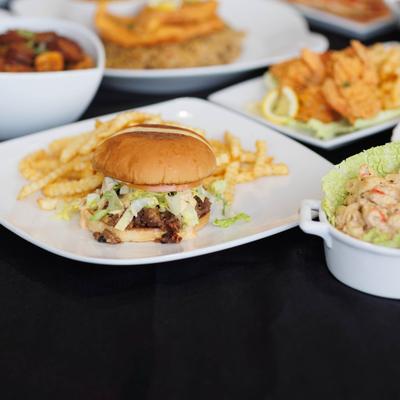 Burger served with crinkle cut fries.