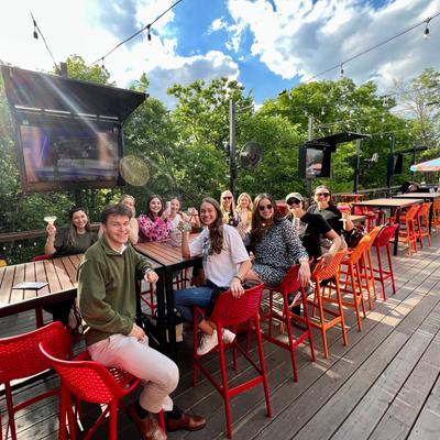 Group of guests smiling at the camera