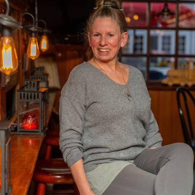 Person looking into the camera and smiling.