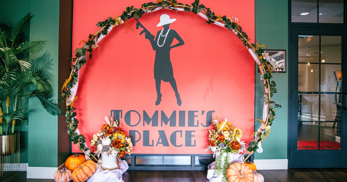 Wall mural depicting Tommie's Place logo