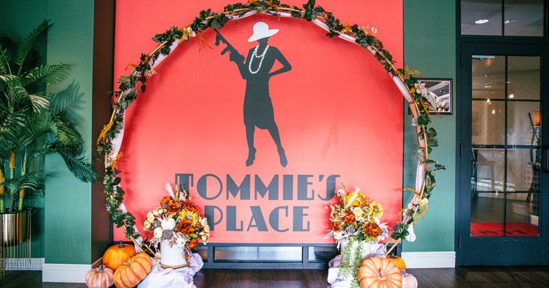 Wall mural depicting Tommie's Place logo