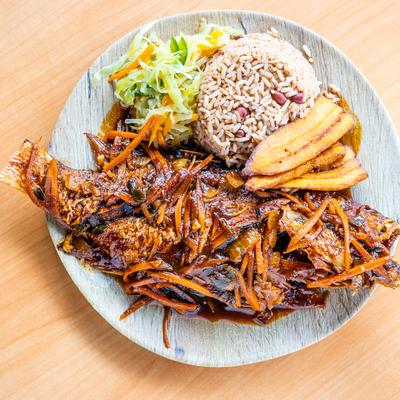 Caribbean Red Snapper Fish, pan-fried then stewed in the classic Jamaican medley of seasonings