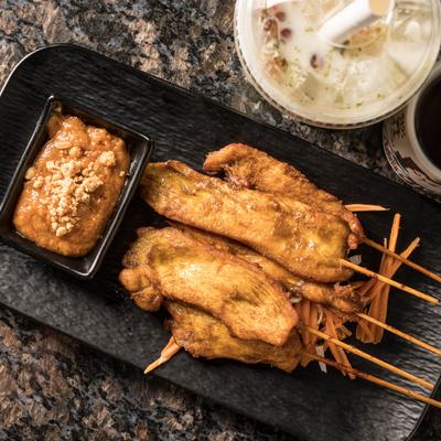 Chicken Satay with peanut sauce.