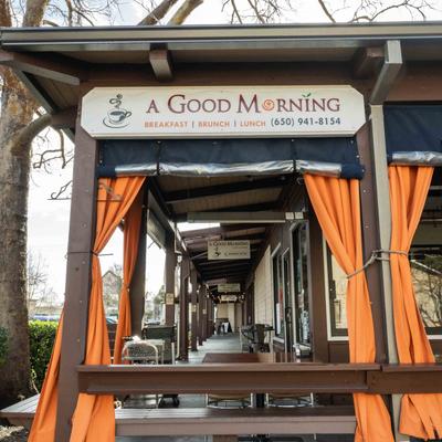 Exterior,outside seating and restaurant's name board