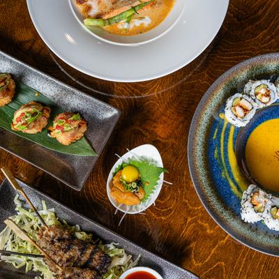 Multiple food plates, overhead view.