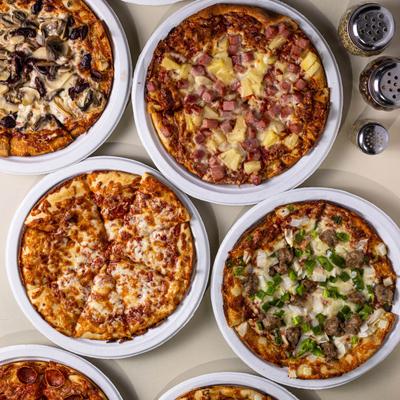 Assorted pizzas, flat lay view