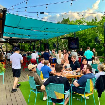 Crowd of guests sitting in the patio