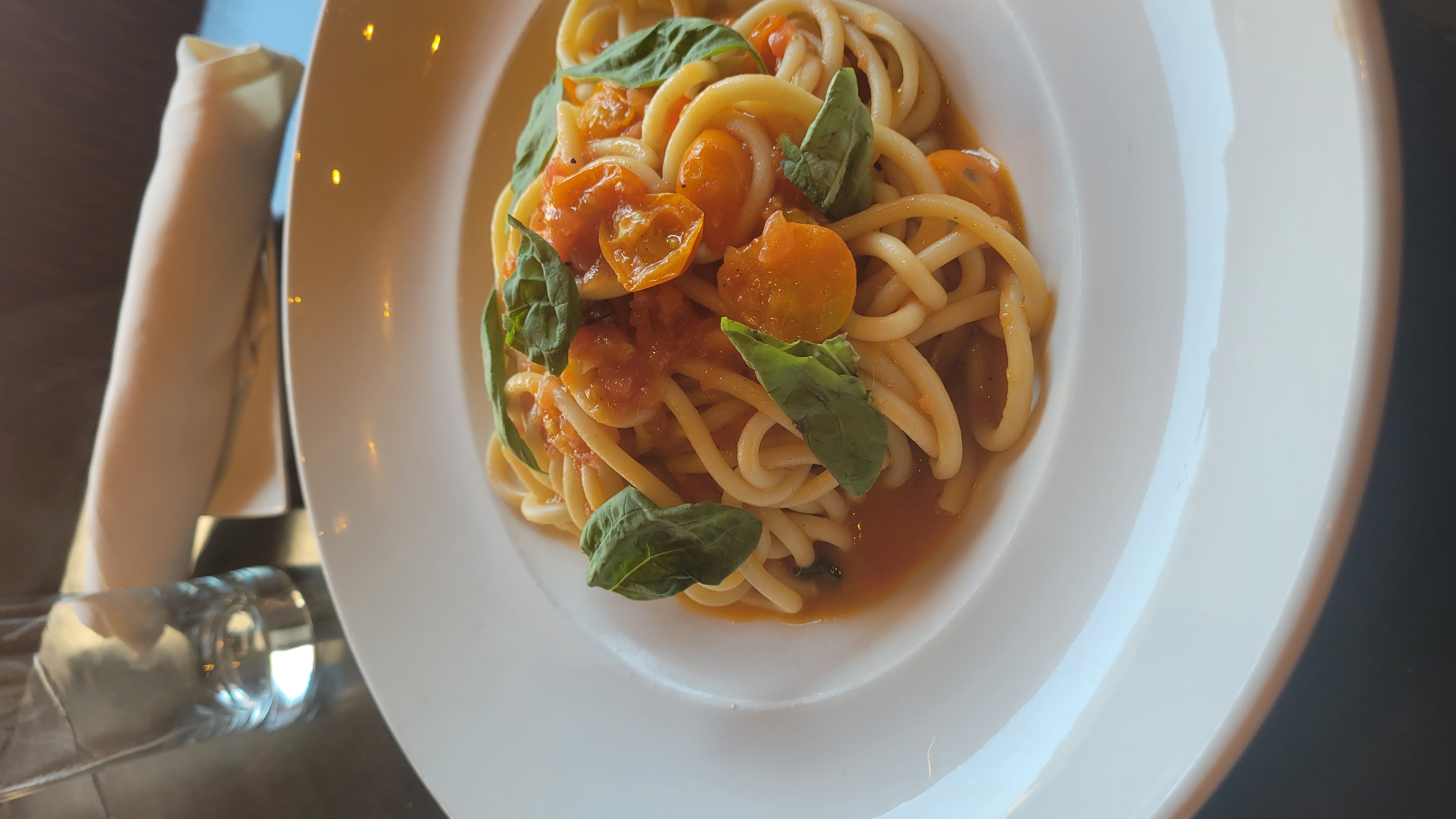 Housemade spaghetti with local heirloom tomato