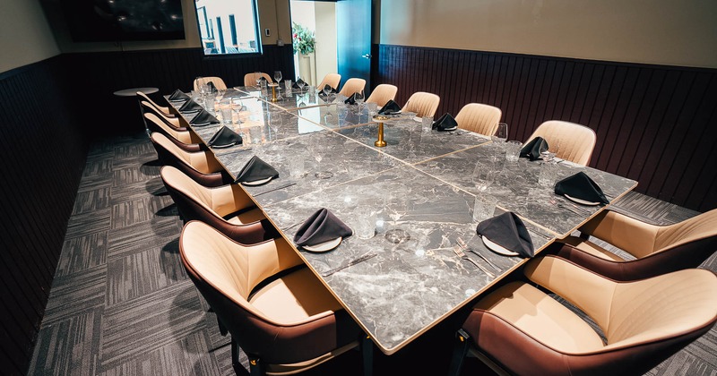 Interior, private room with big guest table and chairs