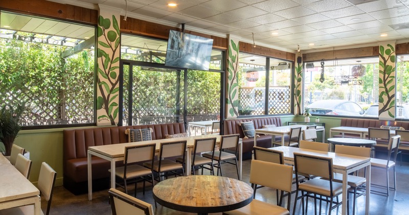 Interior, dining area, tables ready for guests