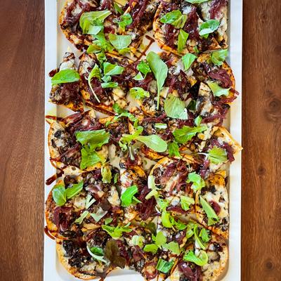 A plate of loaded nachos