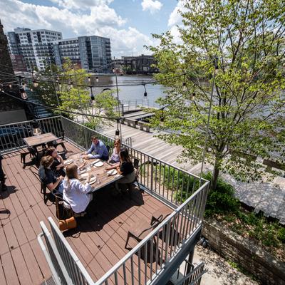 Exterior, guests dining on a terrace