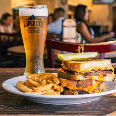 Bonham brisket grilled cheese with fries and a beer.
