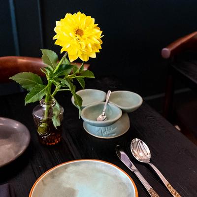 Cutlery on a table set for dining.
