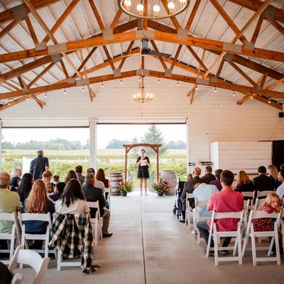 Wedding ceremony in the Pavilion at Next Chapter Winery.