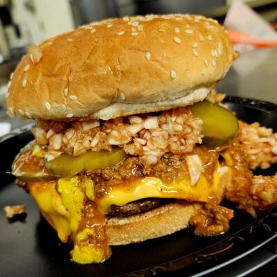 Cheeseburger with chili, bbq slaw and pickles.