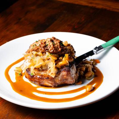 Pork Chop with baked beans.