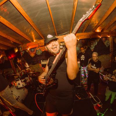 A bass player playing at a gig